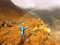 Rainbow in the fog, in front of snowy Himalaya mountains