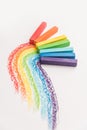 Rainbow gradient made of pastel crayon chalks over the colorful Royalty Free Stock Photo