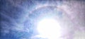 Rainbow halo around the sun. Royalty Free Stock Photo