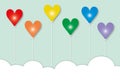Rainbow hearts with clouds on pastel green background, concept of LGBT pride or LGBTQ people. Royalty Free Stock Photo