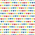 Rainbow hearts hand drawn on a white background. Vector seamless pattern. Blue green orange yellow pink red handmade hearts in a Royalty Free Stock Photo