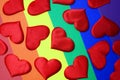 Rainbow homosexual color background with red hearts