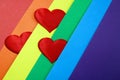 Rainbow homosexual color background with red hearts