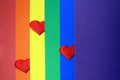 Rainbow homosexual color background with red hearts