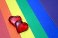 Rainbow homosexual color background with red hearts