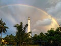 a rainbow just circled over the tower after the rain subsided Royalty Free Stock Photo