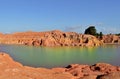 rainbow lake among the red rocks