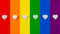 Rainbow LGBT flag background with six small white hearts Royalty Free Stock Photo