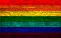 Rainbow LGBT flag on wood background Royalty Free Stock Photo