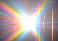 Rainbow light streaks in abstract bright white light burst Royalty Free Stock Photo
