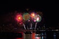 rainbow long tail fireworks on beach and reflection color on water surface