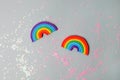 A rainbow made by hands from multi-colored plasticine, clay. Children`s creativity, DIY, handcrafted symbol of lgbt community,