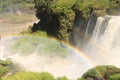 Rainbow made by spray from waterfall Iguazu Argentina Royalty Free Stock Photo