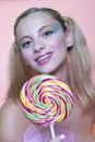 Rainbow makeup and swirl lollipop Royalty Free Stock Photo