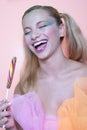 Rainbow makeup and swirl lollipop Royalty Free Stock Photo