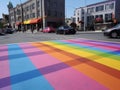 Rainbow markings on the pavement at a pedestrian crossing , View of rainbow pedestrian crossing, Gay Pride Crosswalk. Royalty Free Stock Photo