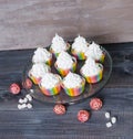 Rainbow merengue cupcakes on with rattan decoration Royalty Free Stock Photo