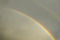 A rainbow is a meteorological phenomenon that is caused by reflection, refraction and dispersion of light in water droplets. Royalty Free Stock Photo