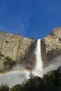 A rainbow in the mist at the base of Bridal Veil Falls in Yosemite Valley, Yosemite National Park, California Royalty Free Stock Photo