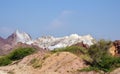 Rainbow mountains and salt domes in Hormuz Island and Royalty Free Stock Photo