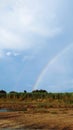 Rainbow natural phenomenon solar eclipse water tree Royalty Free Stock Photo