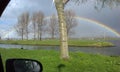 Rainbow outside the car window