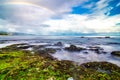 Rainbow ove beach at Laniakea on north shore of Oahu