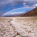 Rainbow over Badwater in Death Valley Royalty Free Stock Photo