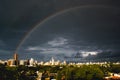 Rainbow over buldings and catheral during sunset in Maringa, Parana, Brazil Royalty Free Stock Photo