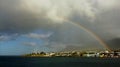 Rainbow over Caribbean Island sky, cruising Caribbean