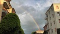 Rainbow over the cloud sky of Modena, Italy