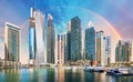 Rainbow over Dubai Marina with skyscrapers, United Arab Emirates