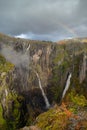 Rainbow over the famous Voringsfossen waterfalls near Hardangervidda, Norway Royalty Free Stock Photo