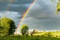 Rainbow over a farm field