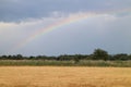 Rainbow over field near small town Stupava, ZÃÂ¡horie Royalty Free Stock Photo