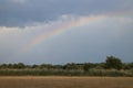 Rainbow over field near small town Stupava, ZÃÂ¡horie Royalty Free Stock Photo