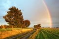 Rainbow over field Royalty Free Stock Photo