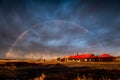 Rainbow over Fishing Lodge Royalty Free Stock Photo