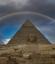 A rainbow over the Great Sphinx and Pyramids of Giza, near Cairo Royalty Free Stock Photo