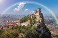 Rainbow over Guaita tower of medieval fortress in San Marino