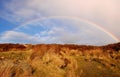 Rainbow over the heather hill Royalty Free Stock Photo