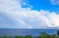 rainbow over the horizone at sea Royalty Free Stock Photo