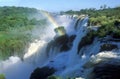 Rainbow over Iguazu Waterfalls in Parque Nacional Iguazu viewed from Upper Circuit, border of Brazil and Argentina Royalty Free Stock Photo