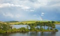 Rainbow over a lake Royalty Free Stock Photo