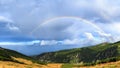 Rainbow over mountains