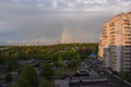 Rainbow over the park in sunny spring day Royalty Free Stock Photo