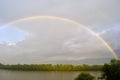 Rainbow over the river Royalty Free Stock Photo