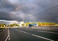 Rainbow over the road in the city Royalty Free Stock Photo