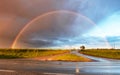 Rainbow over road