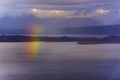 Rainbow over sea with islands Royalty Free Stock Photo